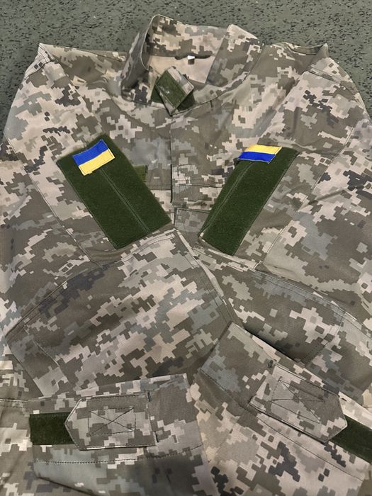 Демисезонный камуфляжный костюм.