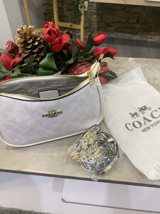 Mala senhora  coach nova muito elegante e muito bom acabamento