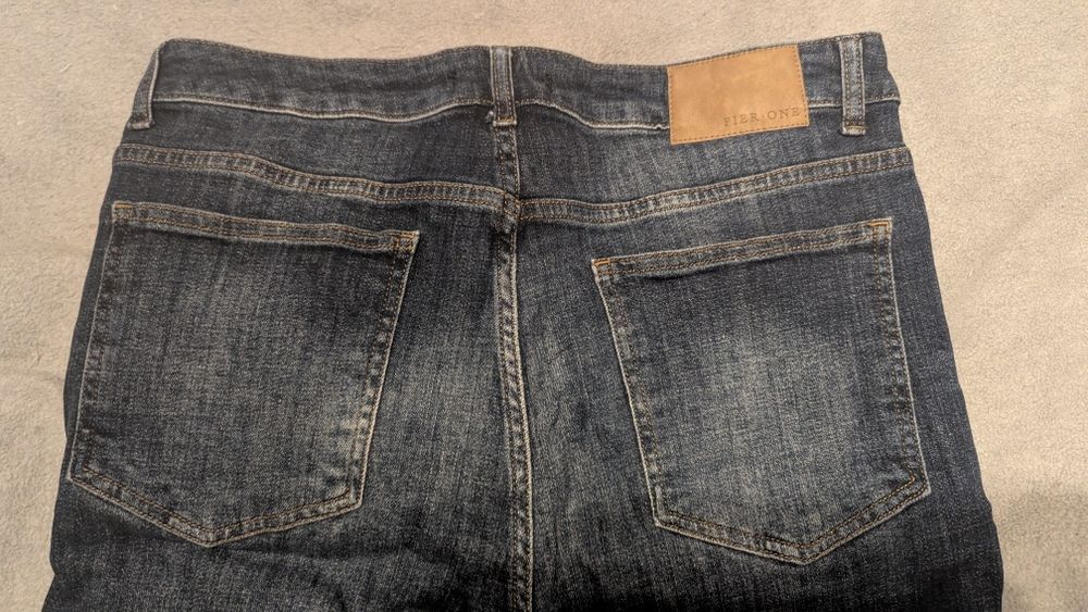 Spodnie jeansy dżinsy Pier One bawełna elastan dziura kolano 34/34