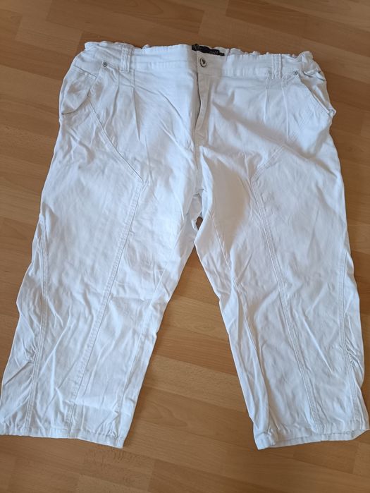 Białe spodnie damskie 52