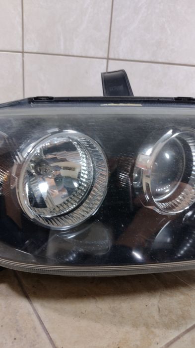 Mazda 2 II Lift DY lampa reflektor Europa prawy przód wysyłka