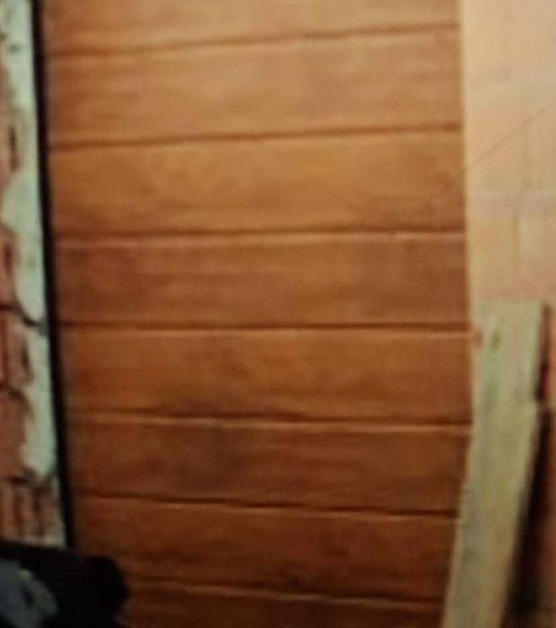 dwie bramy garażowe automatyczne na piloty MIGAS DOOR