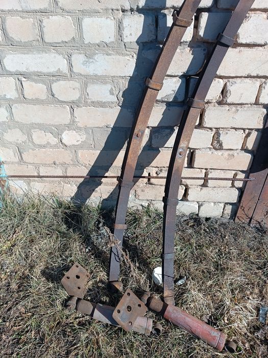 Продам ресори та кронштейн причепа