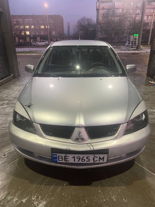 Лансер 1,6 бензин