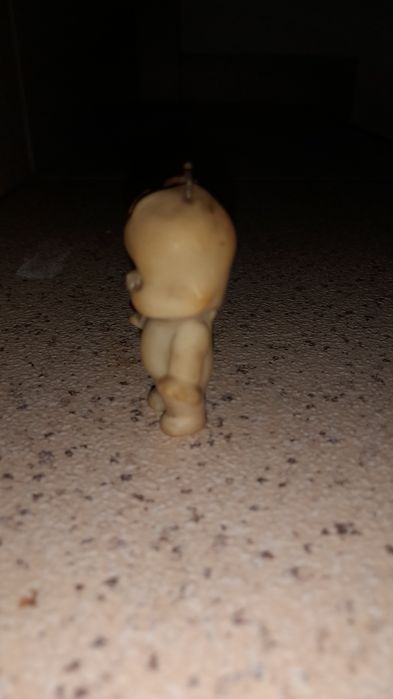 Pequeno boneco antigo