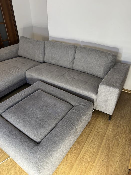 Szary duży narożnik z dostawianą pufą