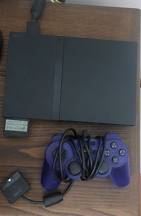 PS2 with Additional Games in Original Condition64729401033090120
