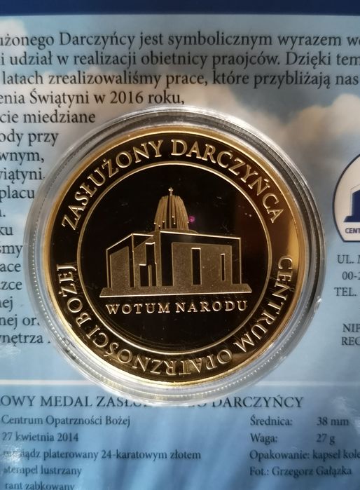 Dwa medale pamiątkowe.