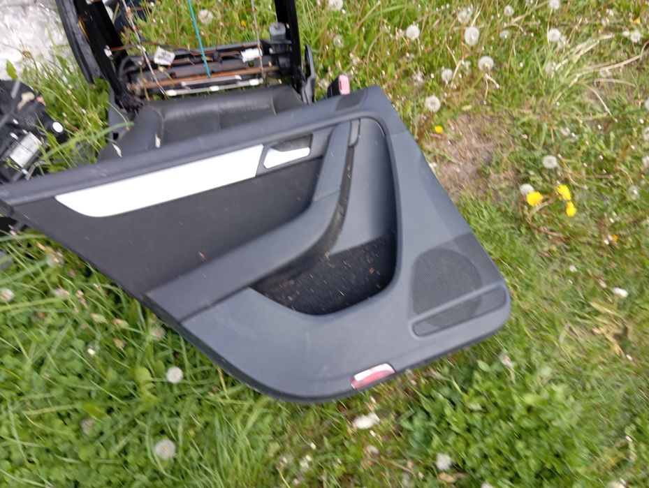 Boczek tapicerka drzwi tył lewy Volkswagen Passat B7 Sedan