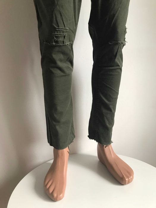Nowe rurki spodnie dziury material meskie zielone khaki L