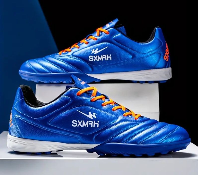 Футбольне взуття бутси,сороконіжки