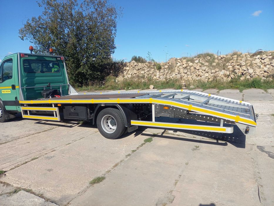 Auto Pomoc  Holowanie Autolaweta Transport bus ciagniki maszyny