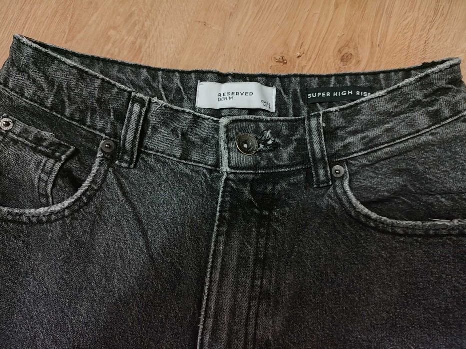 Jeansy damskie Reserved