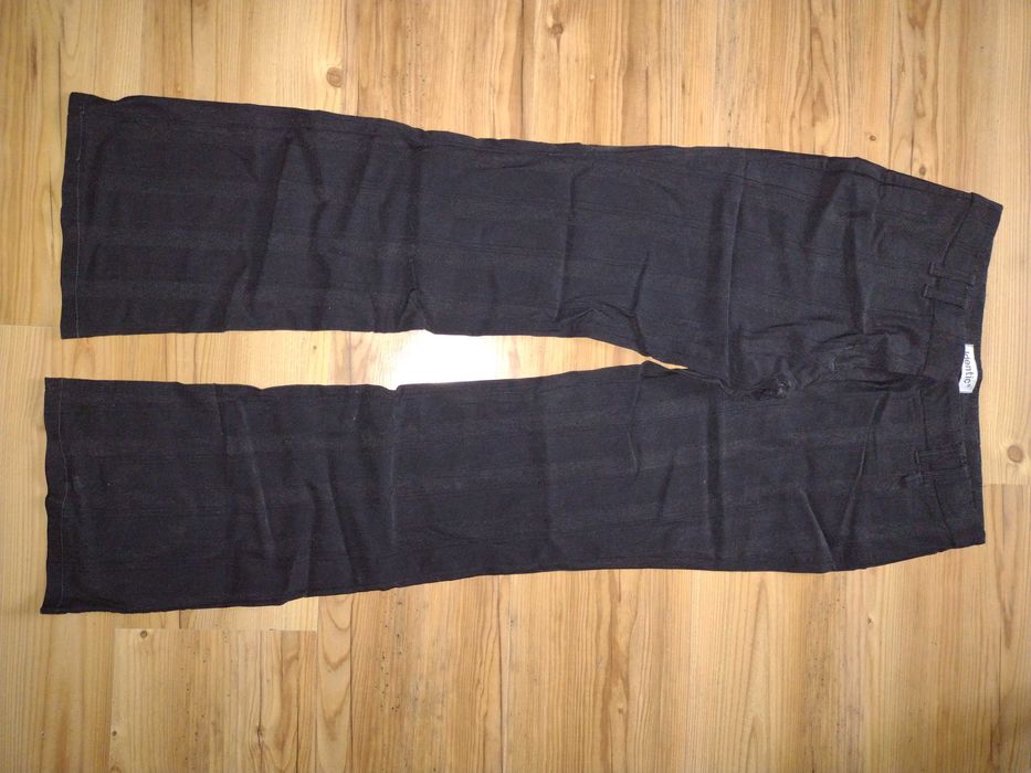 Czarne spodnie biodrówki