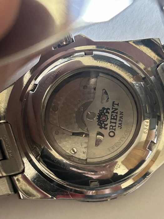 Orient Planet Automatic Watch Black Dial Date Power Reserve