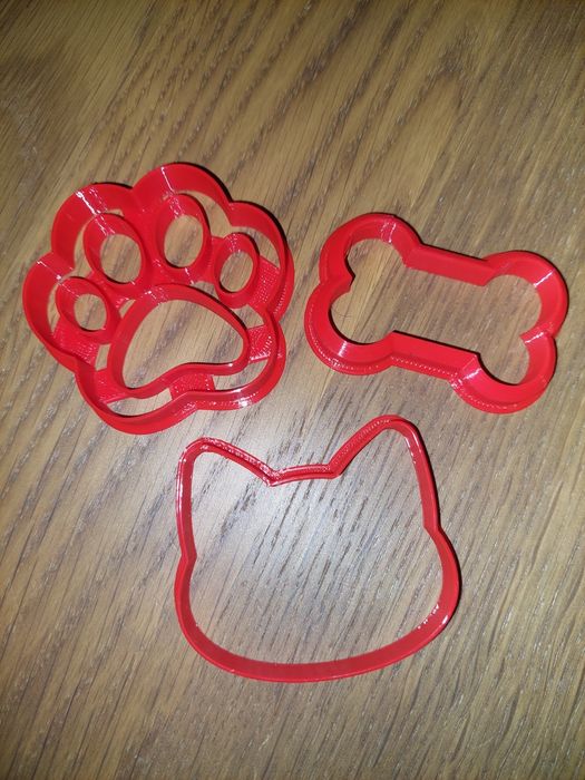 Forma de bolachas em forma de pata e cara de gato