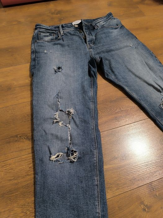Spodnie jeansowe z przetarciami W30/34