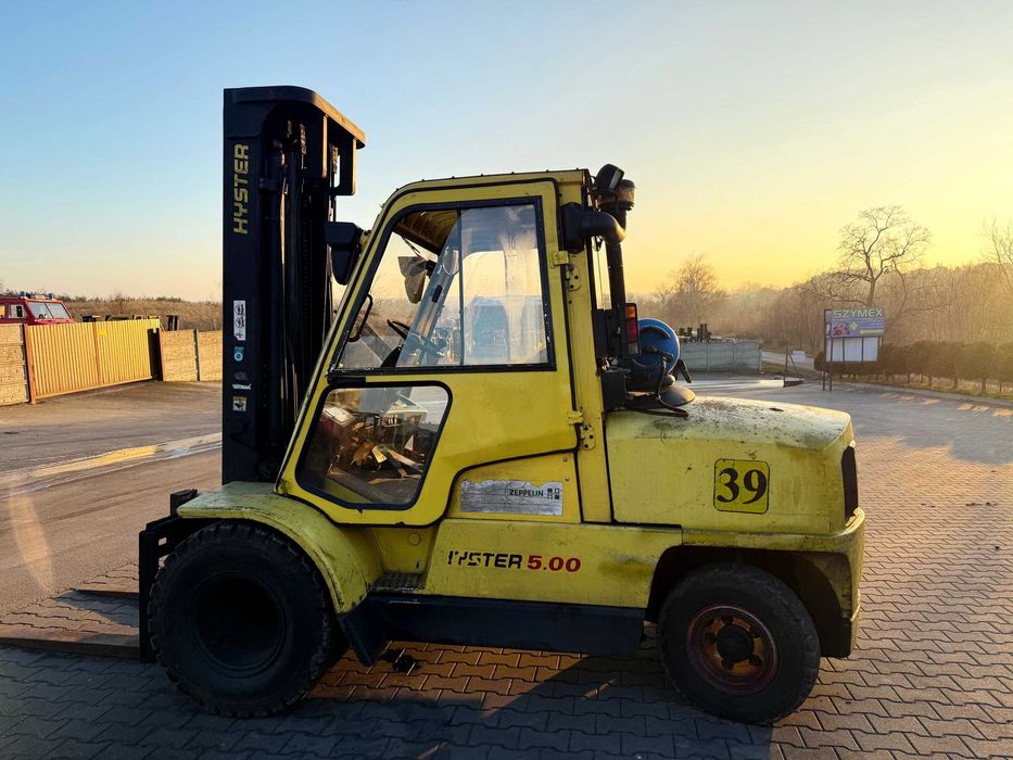 Вилочний навантажувач HYSTER H5.00XM триплексна щогла 5,7м вантажопідйомність 5000 кг подвійні колеса, 2005 р.в.