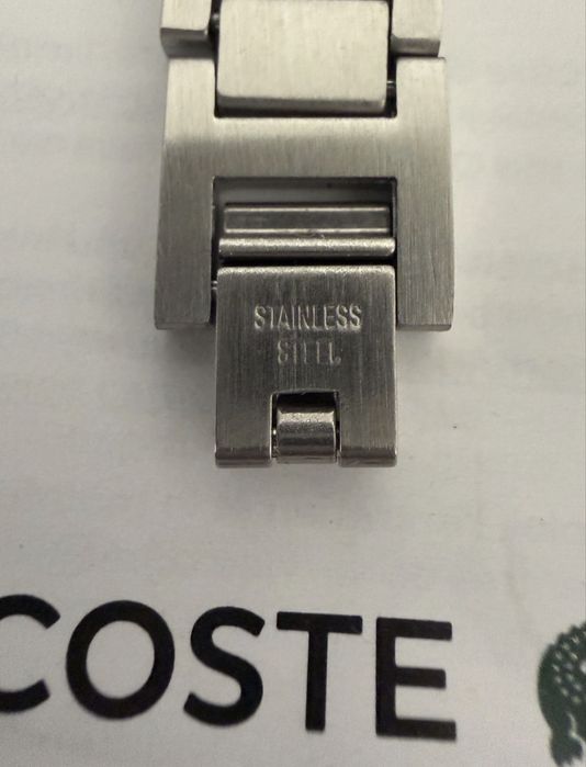Браслет Lacoste в упаковці. Довжина 21 см.