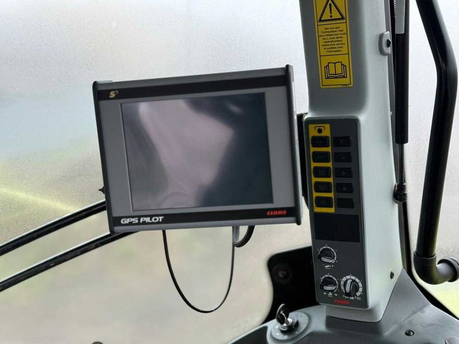 Трактор Claas Axion 810 2013