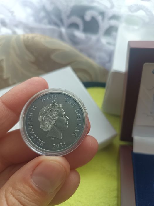 Срібна монета небесні покровителі