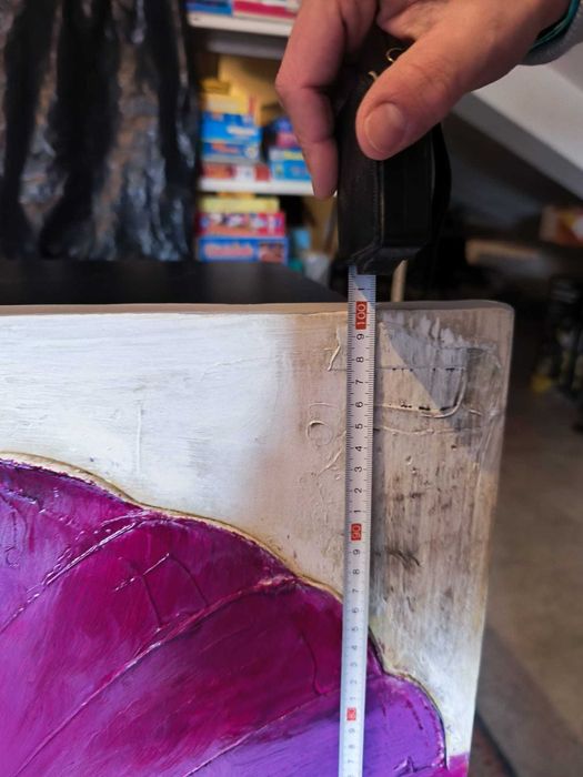 Quadro com uma flor roxa