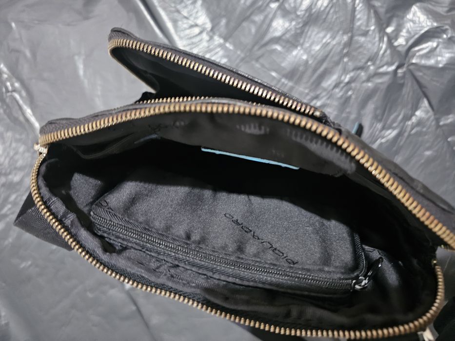 Шкіряна сумка Piquadro та Timberland