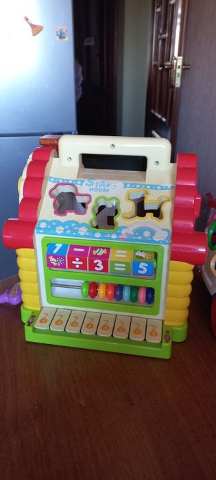 Іграшки для розвитку,музичний телефон,музичний дім(сортер)