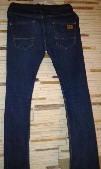 Spodnie jeans 164