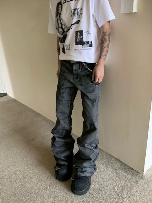 Dirty wash flared jeans