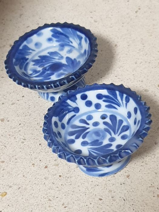 Pair of small antique Asian salt cellars in faience