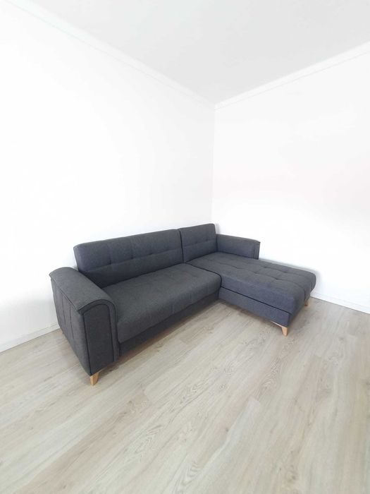 Sofá-cama com arumação