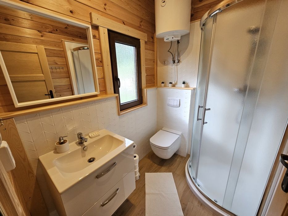 Domki letniskowe Przy Leśniczówce - Sauna - Jacuzzi - Domki nad jeziorem- Bory Tucholskie- Kaszuby, rodzinny wypoczynek, plac zabaw, stawy
