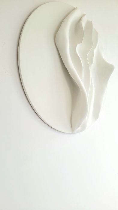 Okrągła płaskorzeźba - rzeźba ścienna