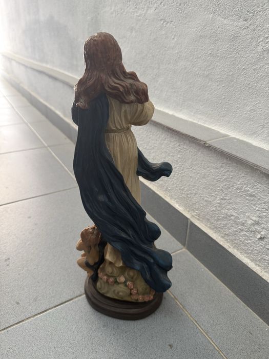 Santa com anjos, antiguidade