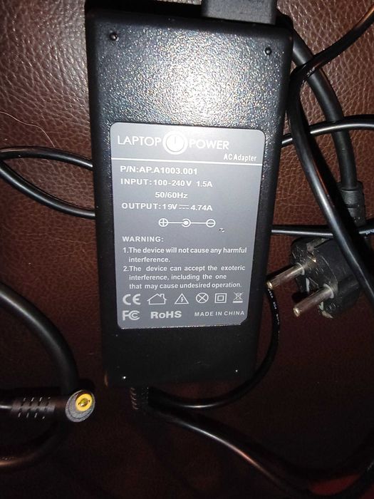 Ładowarka  Rower El.. 54,5 V A i zasilacze HP i zasilacz marki Laptop Power.