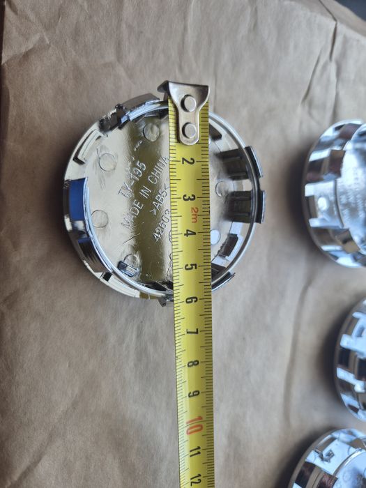 Dekielki Zaślepki kapsle do alu felg do Toyota czarne 61/61mm promocja