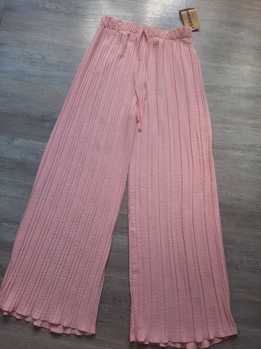 Piękne eleganckie pudrowy róż plisowanych spodni uni.M/4XL