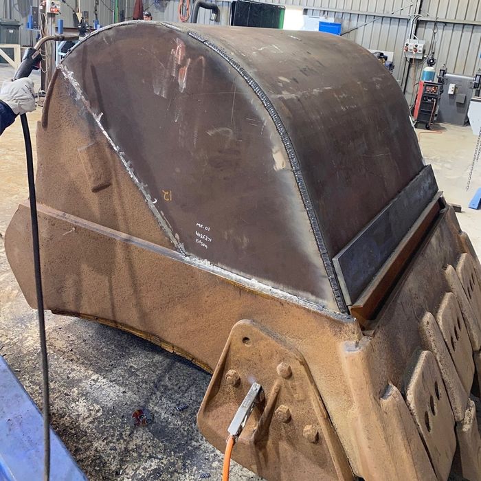 Reparação de baldes de máquinas