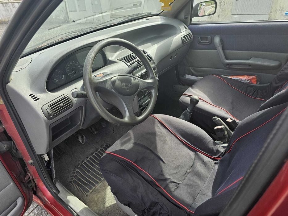 Fiat Punto 55. Alguns extras.