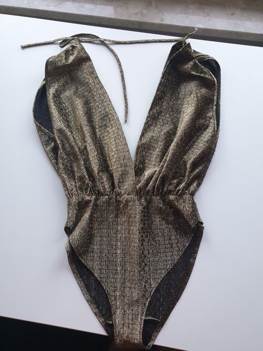 Błyszczące złote body