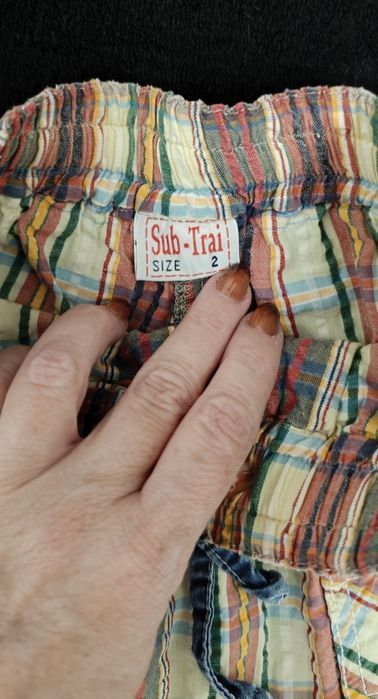 Saia multicolor criança