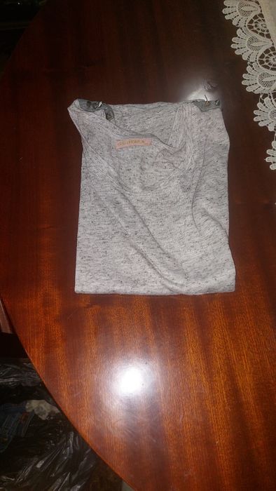 Roupa usada em bom estado