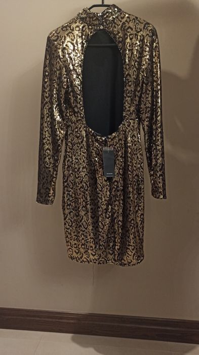 Sukienka cekiny sylwestrowa odkryte plecy nowa Reserved r. L