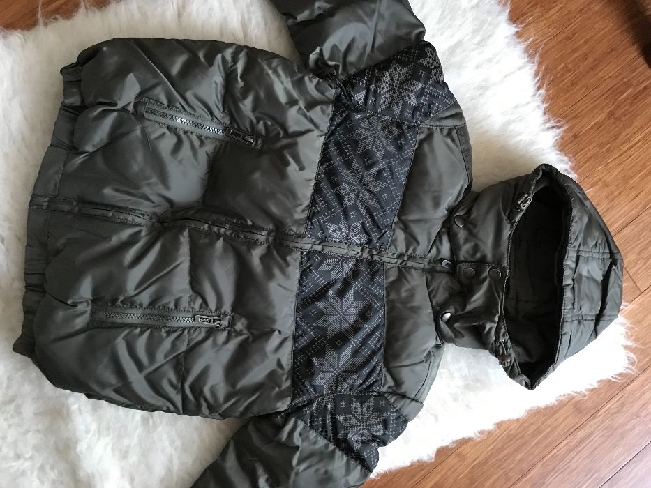 Продам новый пуховик Sela