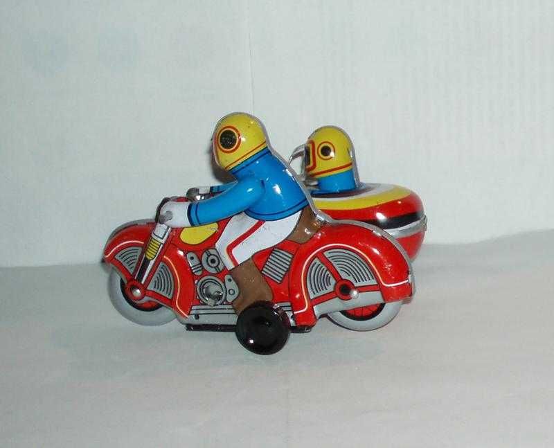 Новая коллекционная заводная игрушка мотоциклист ретро стиль жесть