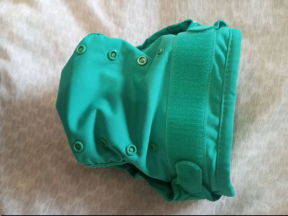 Продам багато разовий підгузник на скільки кг на фото