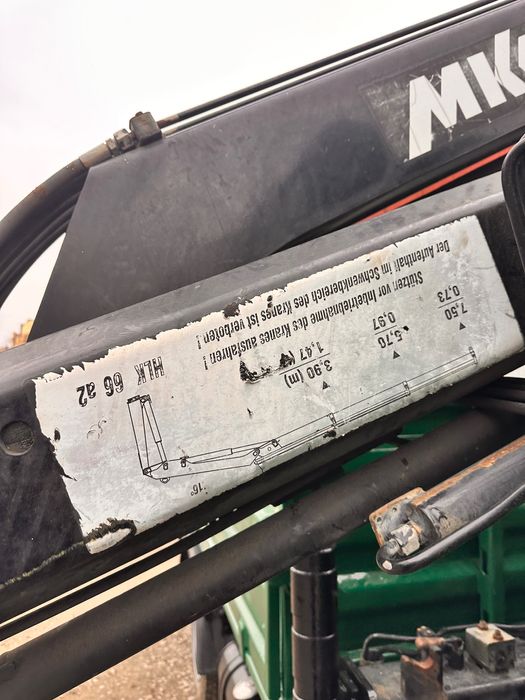 Кран маніпулятор самоскид man