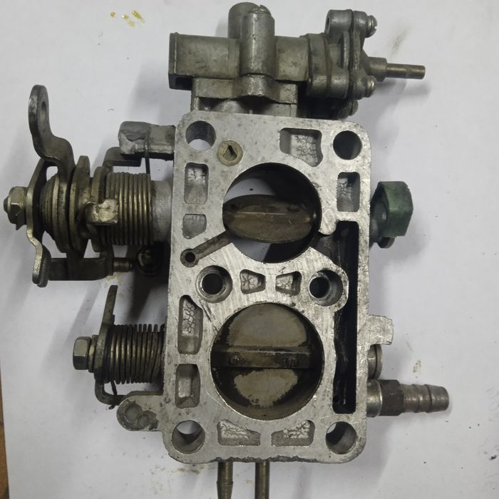 Нижня частина карбюратора газель Волга газ