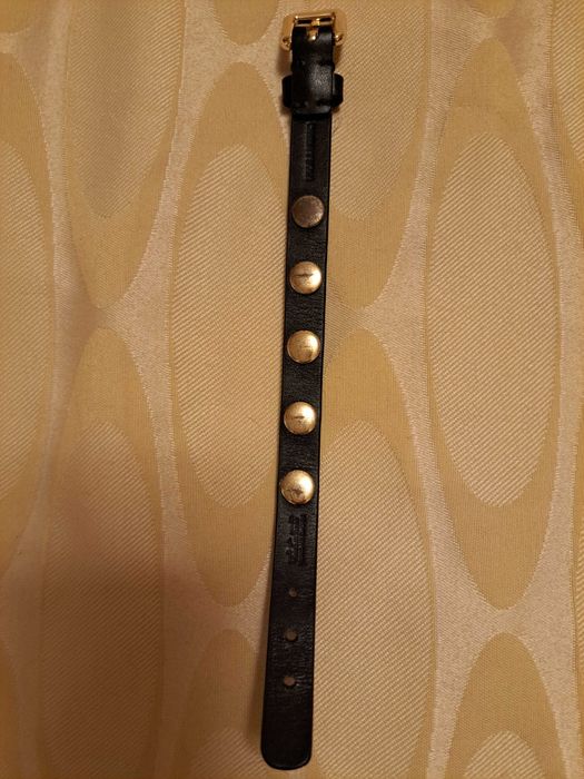 Pulseira Bimba y Lola preta e dourada